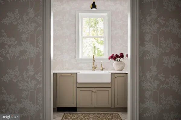 a bathroom with a sink toilet and window