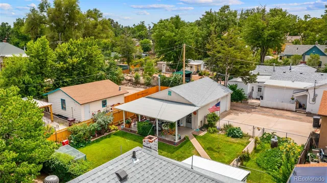 an aerial view of a house with a garden