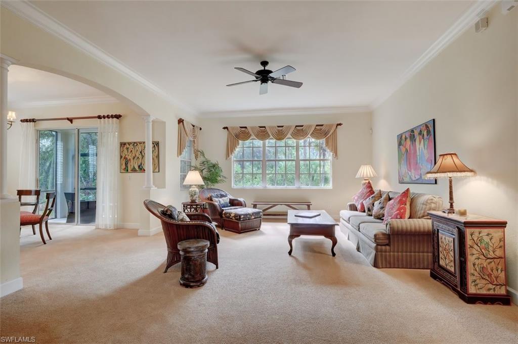16092 Parque Lane Naples, FL 34110 - Photo 20 of 35 a living room with furniture and a window