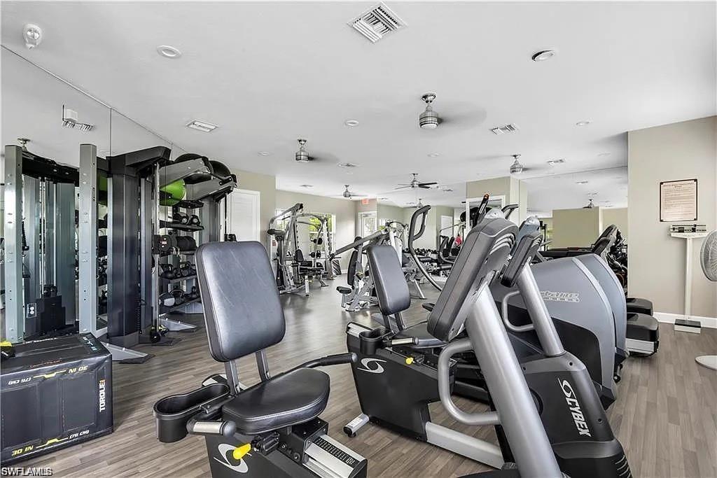 16092 Parque Lane Naples, FL 34110 - Photo 34 of 35 a view of a room with gym equipment