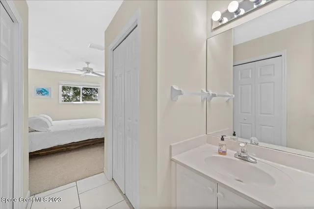 a en suite bathroom with a bathtub and a sink