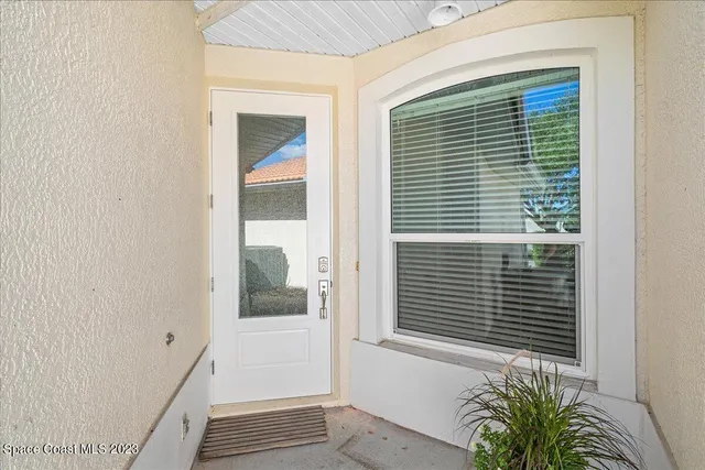 a view of a entryway front of a house