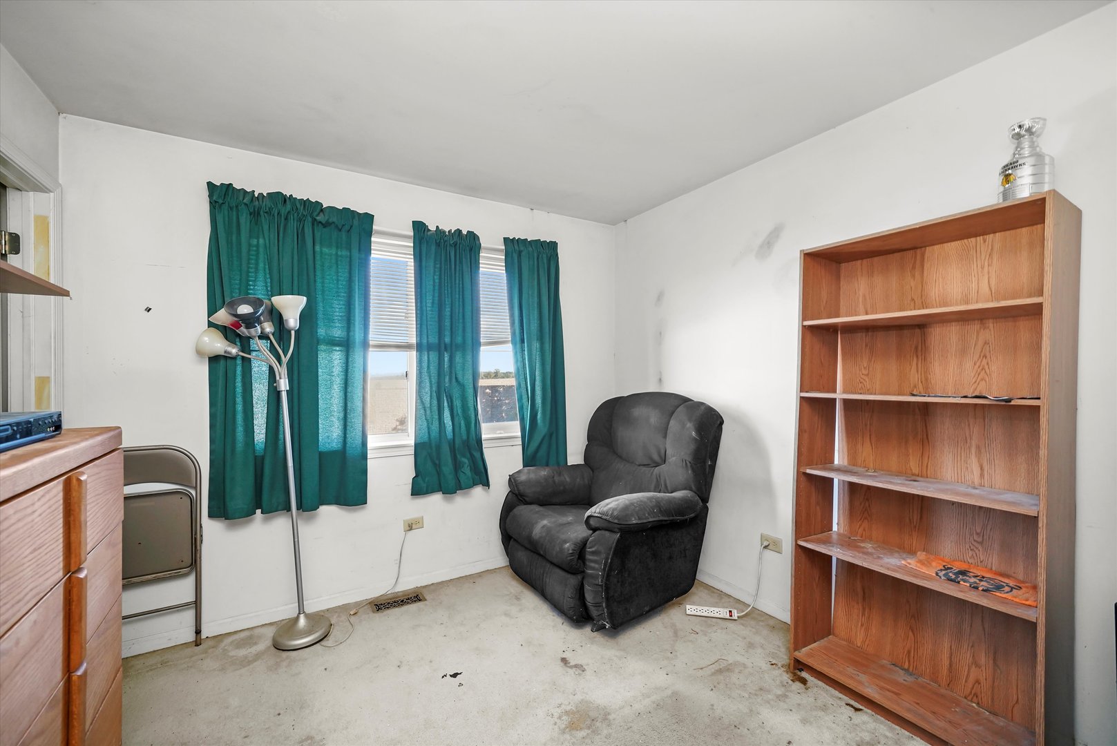 731 Bobwhite Lane New Lenox, IL 60451 - Photo 13 of 26 a living room with furniture a floor to ceiling window and a couch