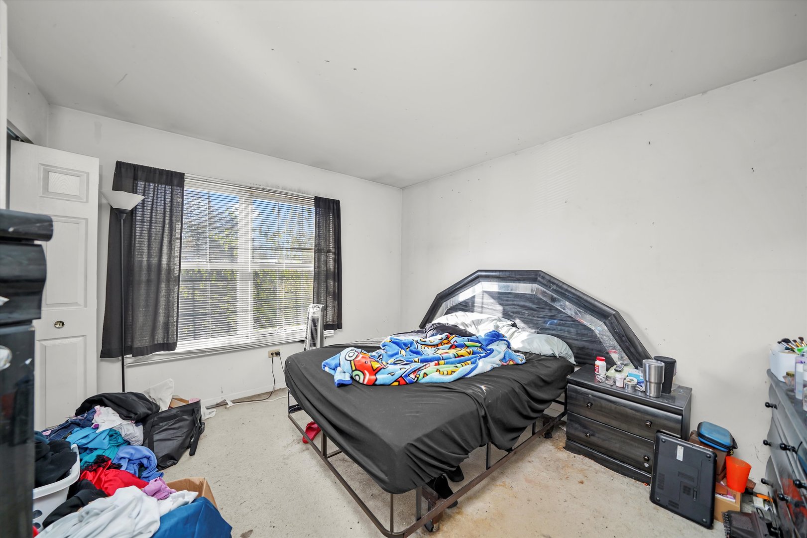 731 Bobwhite Lane New Lenox, IL 60451 - Photo 15 of 26 a bedroom with a bed and a window