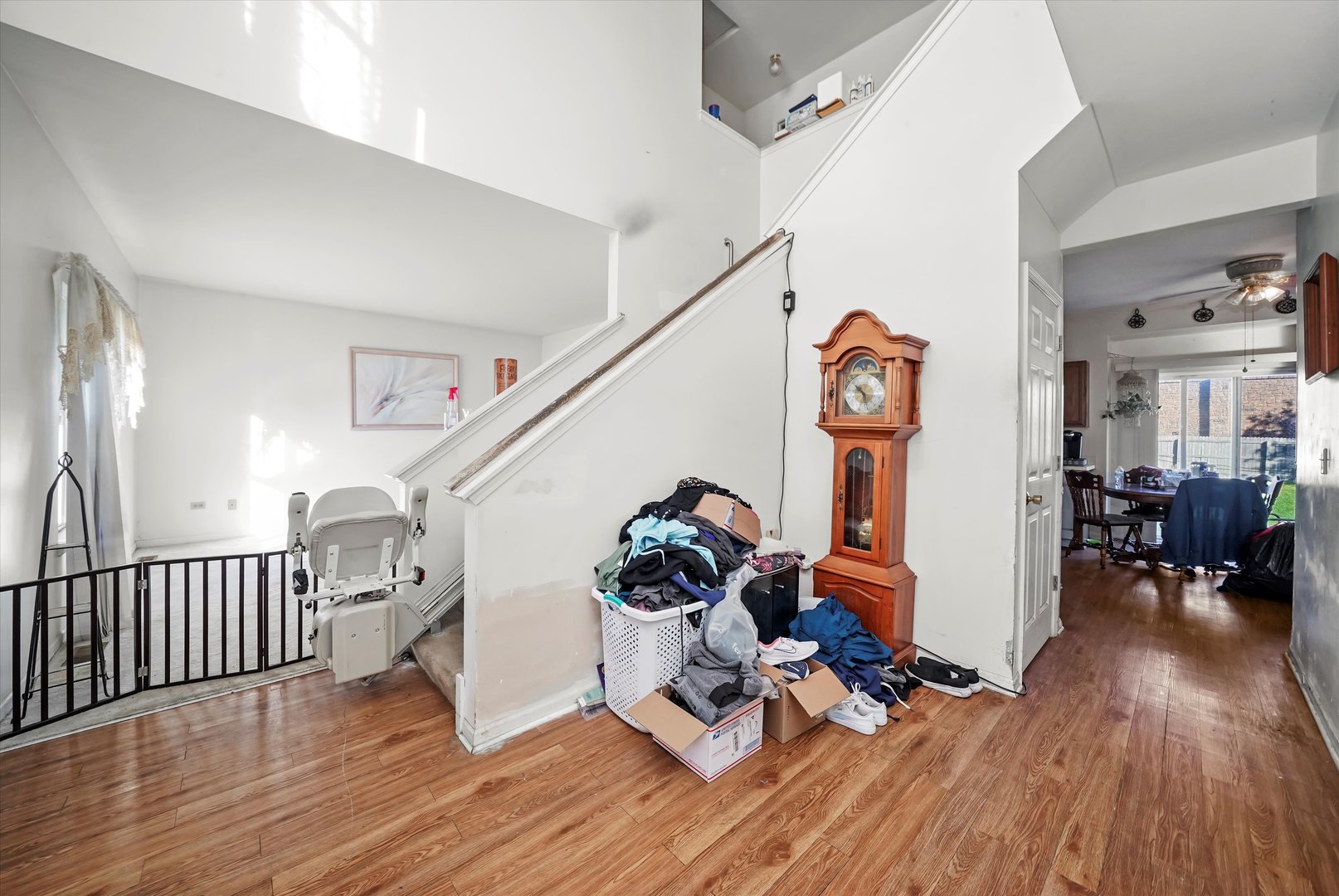 731 Bobwhite Lane New Lenox, IL 60451 - Photo 2 of 26 a view of entryway with wooden floor and stairs