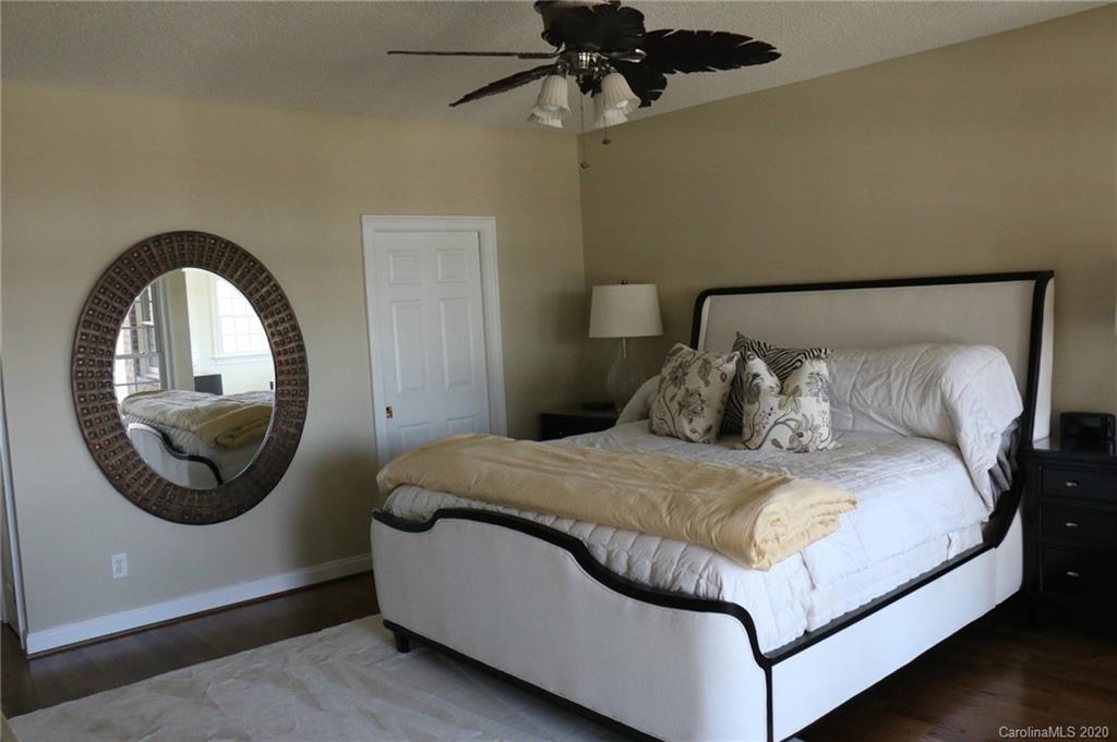 3215 Startown Road Lincolnton, NC 28092 - Photo 21 of 39 a bedroom with a bed and a mirror