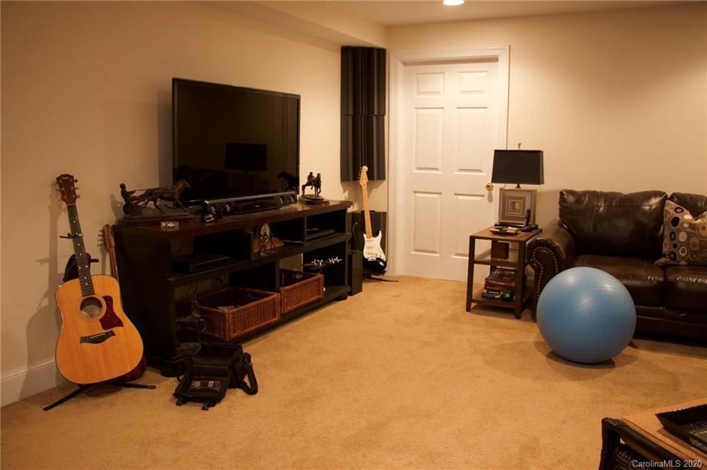 3215 Startown Road Lincolnton, NC 28092 - Photo 26 of 39 a room with furniture and flat screen tv