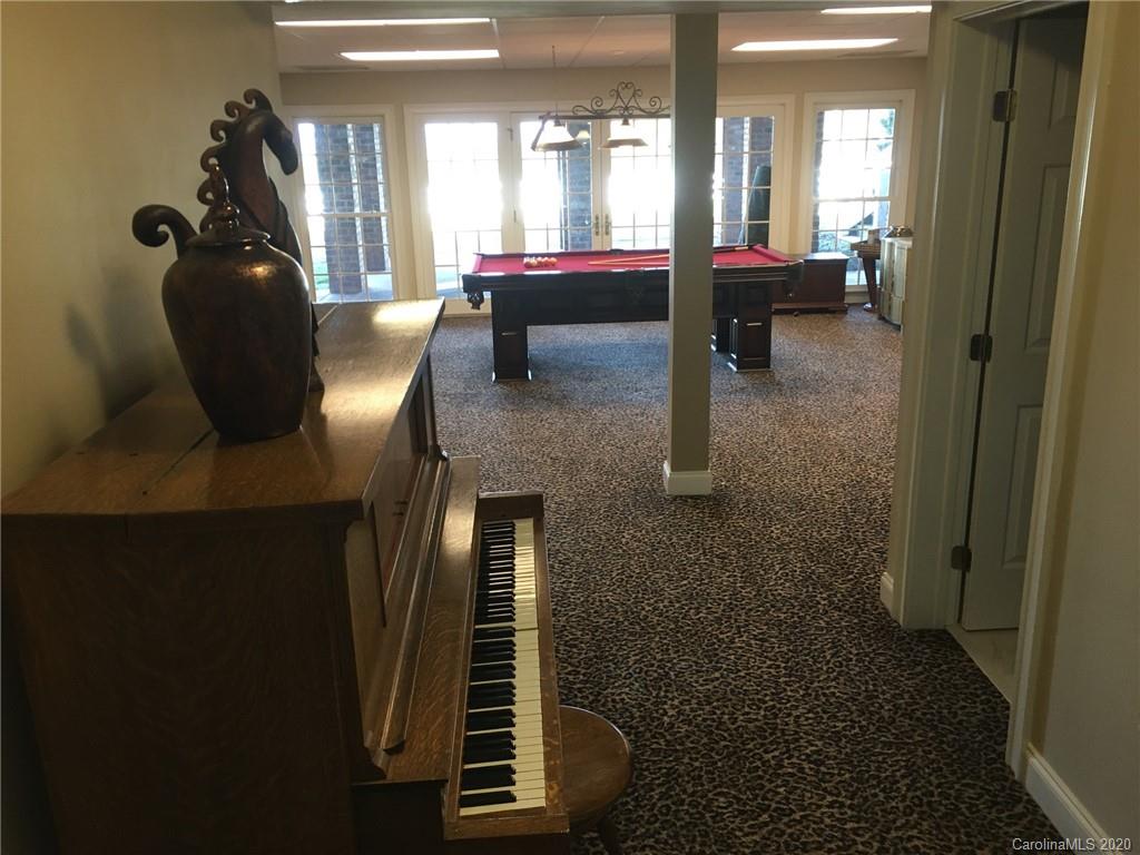 3215 Startown Road Lincolnton, NC 28092 - Photo 28 of 39 a living room with furniture and a fireplace