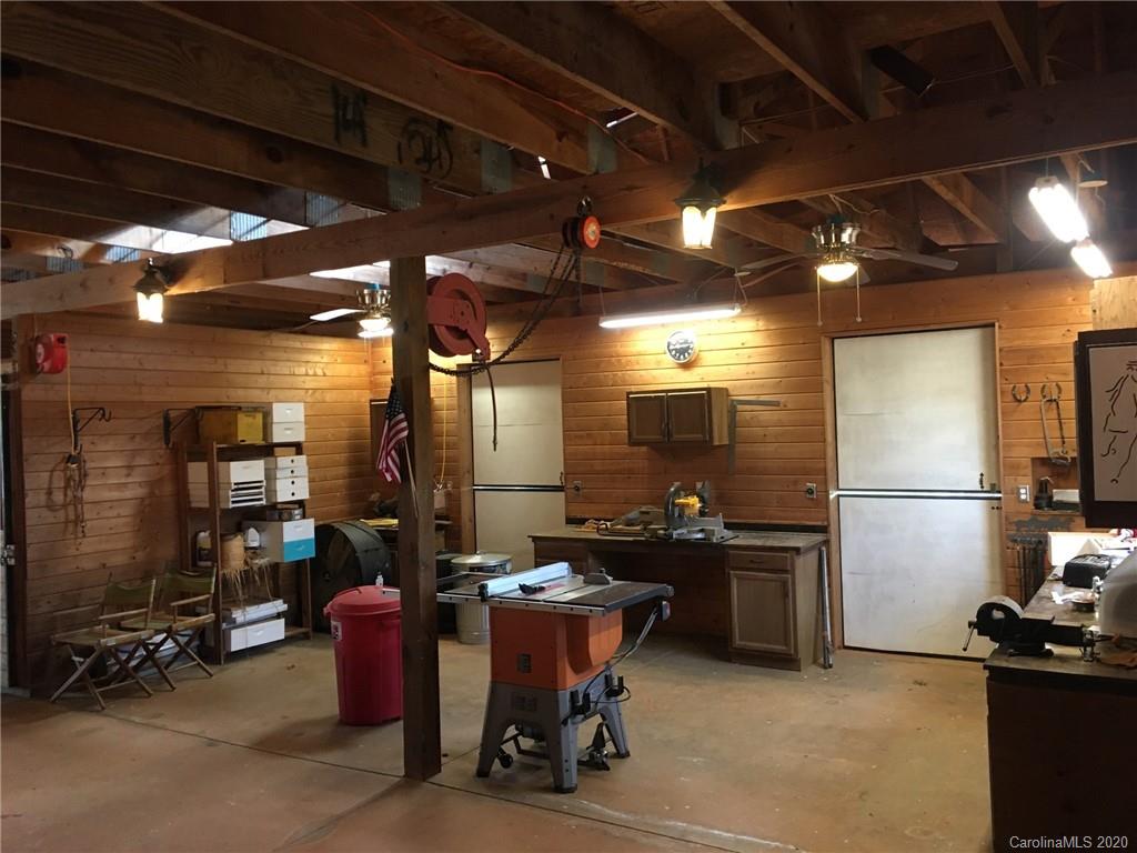 3215 Startown Road Lincolnton, NC 28092 - Photo 33 of 39 a kitchen with stainless steel appliances kitchen island granite countertop a sink and a refrigerator
