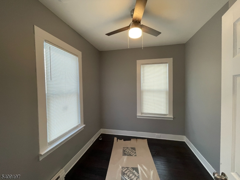 25 Bayview Avenue Newark, NJ 07112 - Photo 4 of 15 an empty room with window