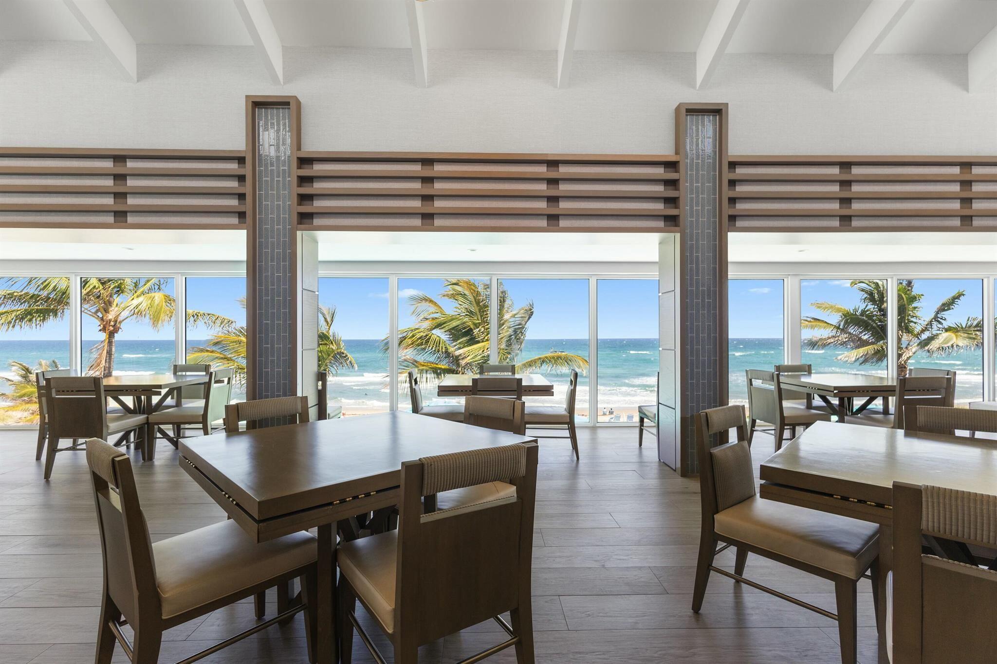 4750 South Ocean Boulevard, Unit 204 Highland Beach, FL 33487 - Photo 29 of 30 a dining room with furniture and wooden floor
