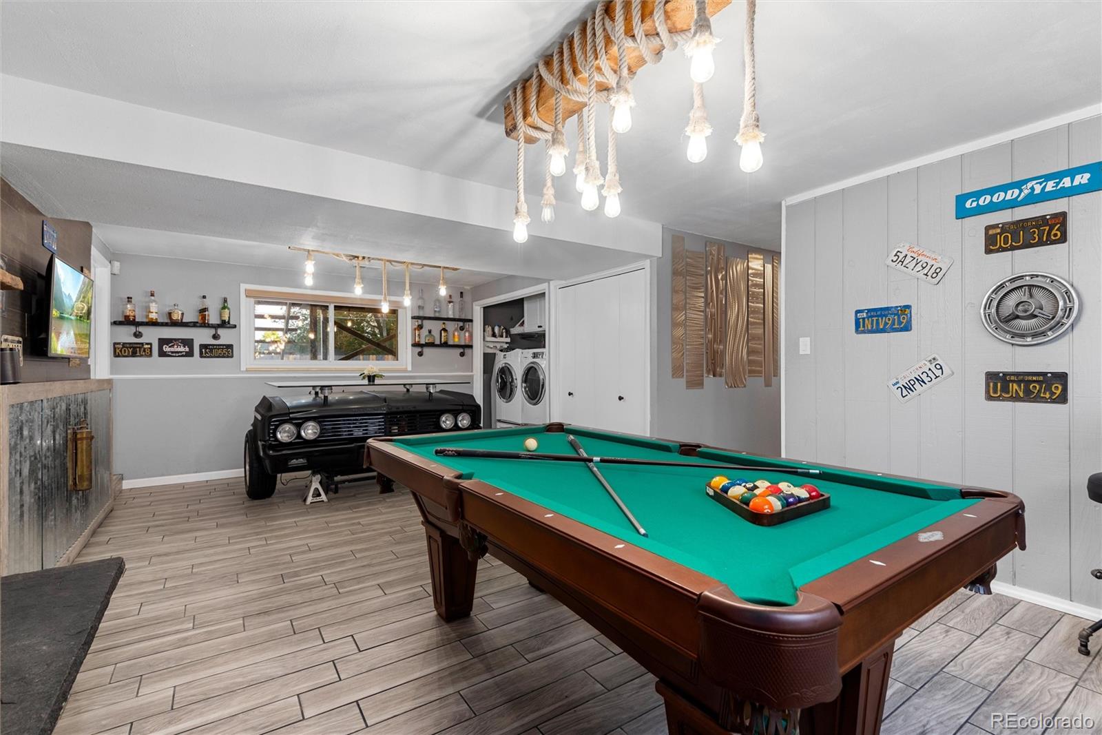 4904 West 61st Drive Arvada, CO 80003 - Photo 21 of 37 a room with furniture and pool table