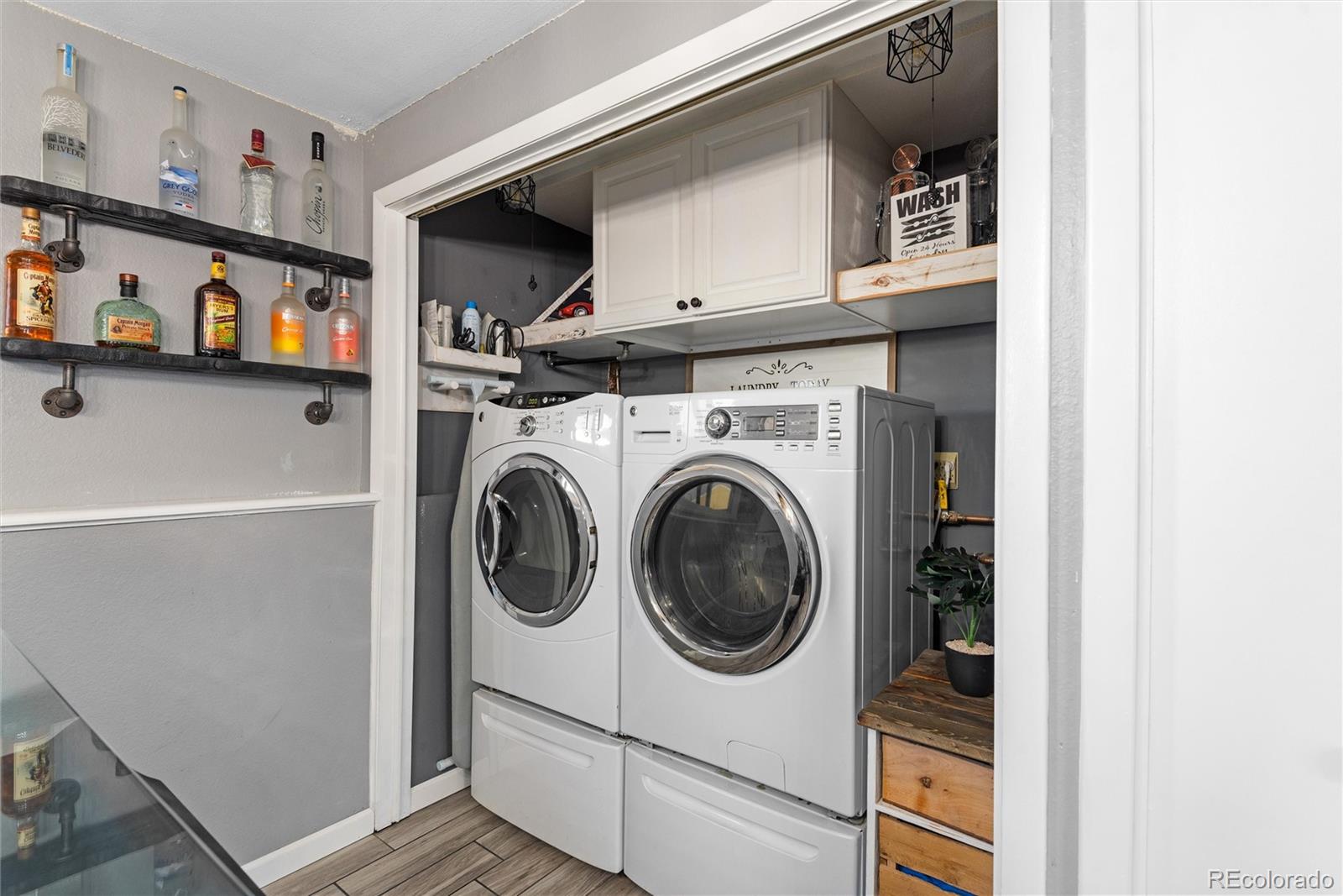 4904 West 61st Drive Arvada, CO 80003 - Photo 25 of 37 a utility room with dryer and washer