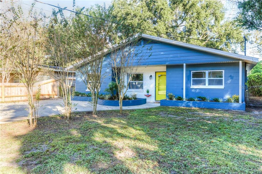 1815 Weeks Avenue Orlando, FL 32806 - Photo 1 of 1 a view of a house with backyard porch and sitting area