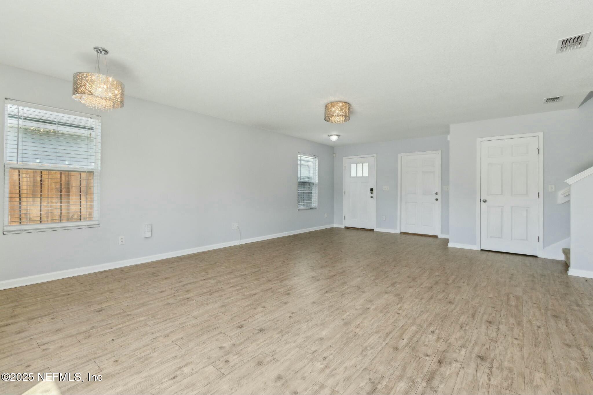 8414 Thor Street Jacksonville, FL 32216 - Photo 15 of 40 an empty room with a window