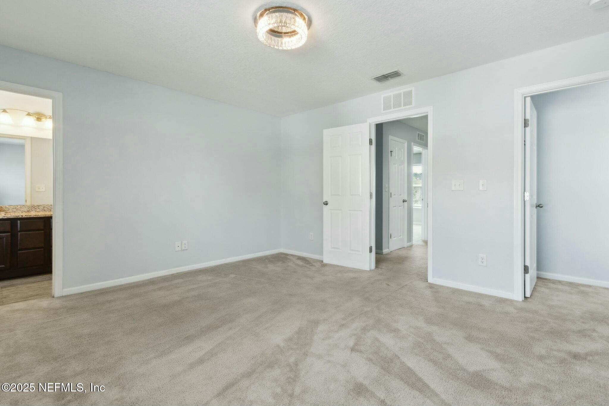 8414 Thor Street Jacksonville, FL 32216 - Photo 32 of 40 an empty room with window