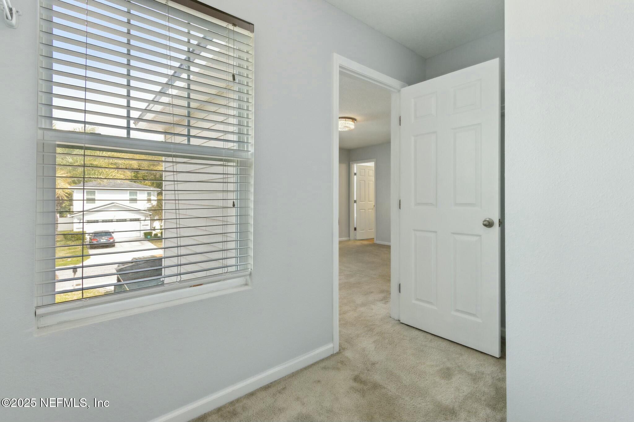 8414 Thor Street Jacksonville, FL 32216 - Photo 34 of 40 a view of a room that has a window in it