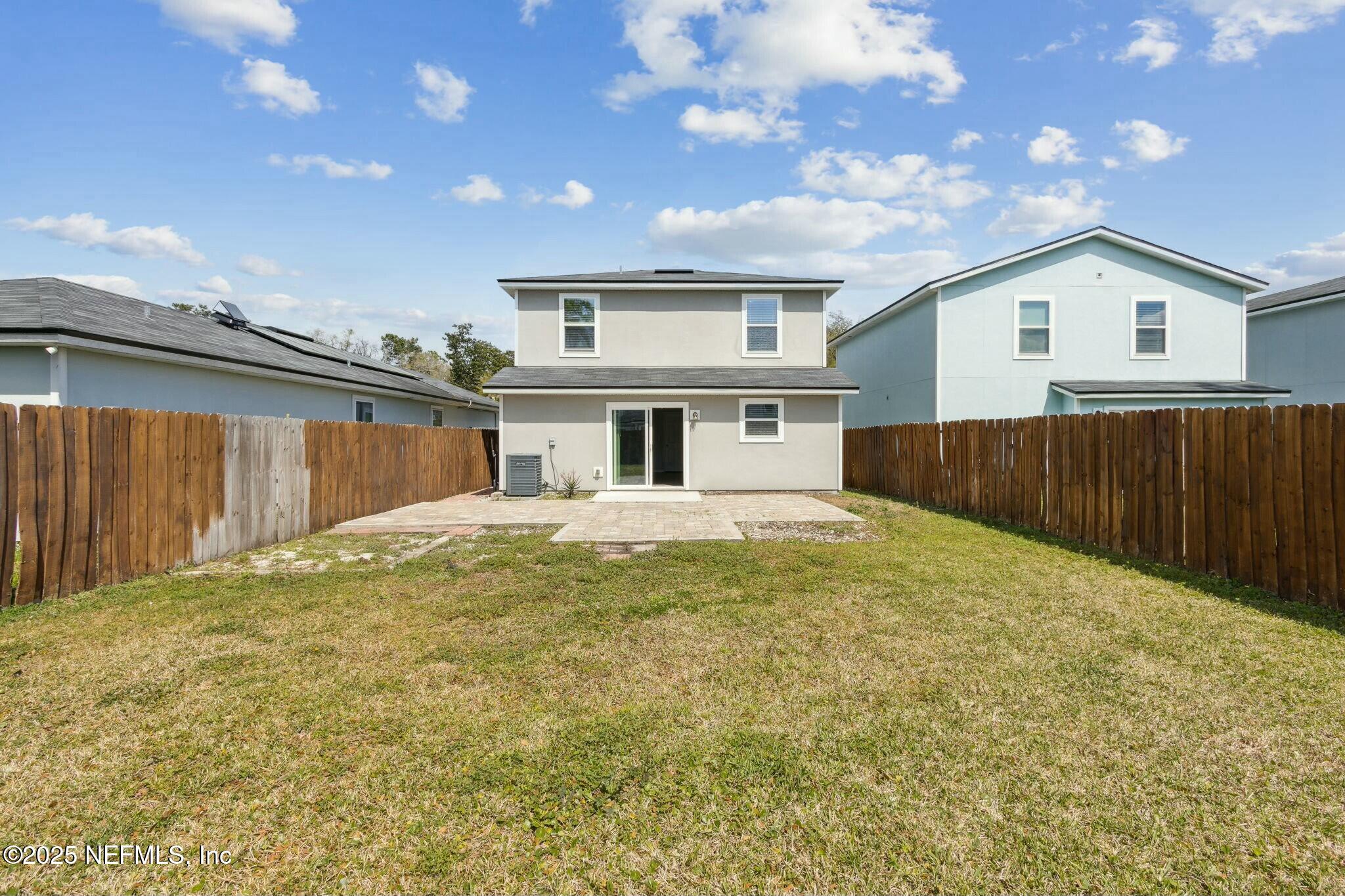 8414 Thor Street Jacksonville, FL 32216 - Photo 37 of 40 a house view with swimming pool in front of it