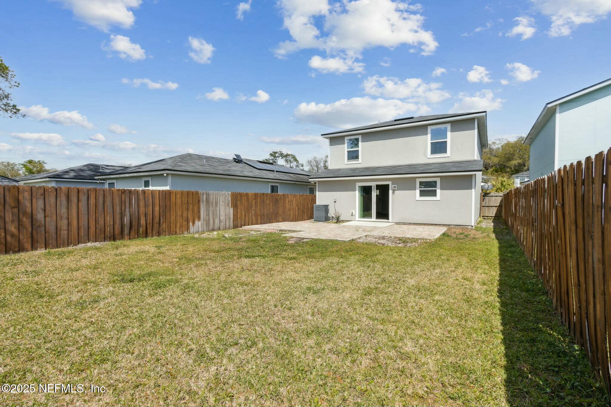 8414 Thor Street Jacksonville, FL 32216 - Photo 38 of 40 a view of a house with a backyard