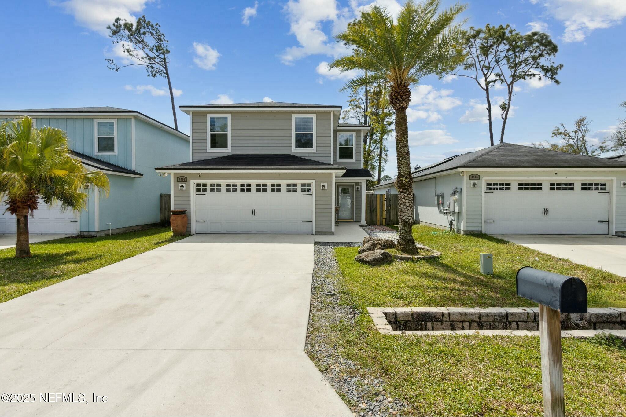 8414 Thor Street Jacksonville, FL 32216 - Photo 5 of 40 a front view of a house with garden