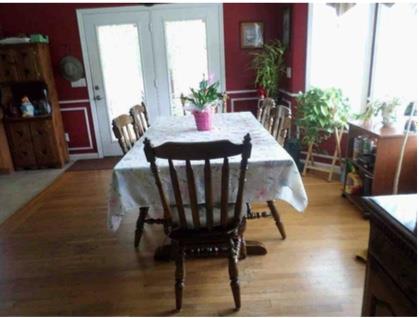 2590 Holloway Road Lebanon, TN 37090 - Photo 11 of 19 a view of a dining room with furniture window and wooden floor