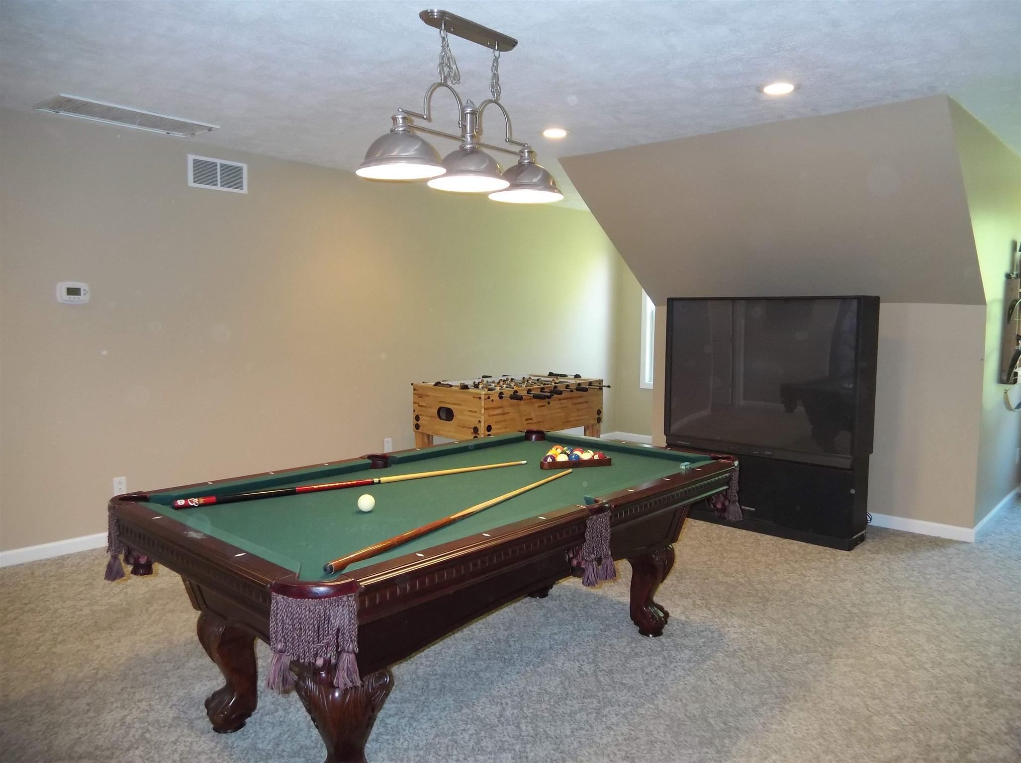 2590 Holloway Road Lebanon, TN 37090 - Photo 16 of 19 a room with pool tables and wooden floor
