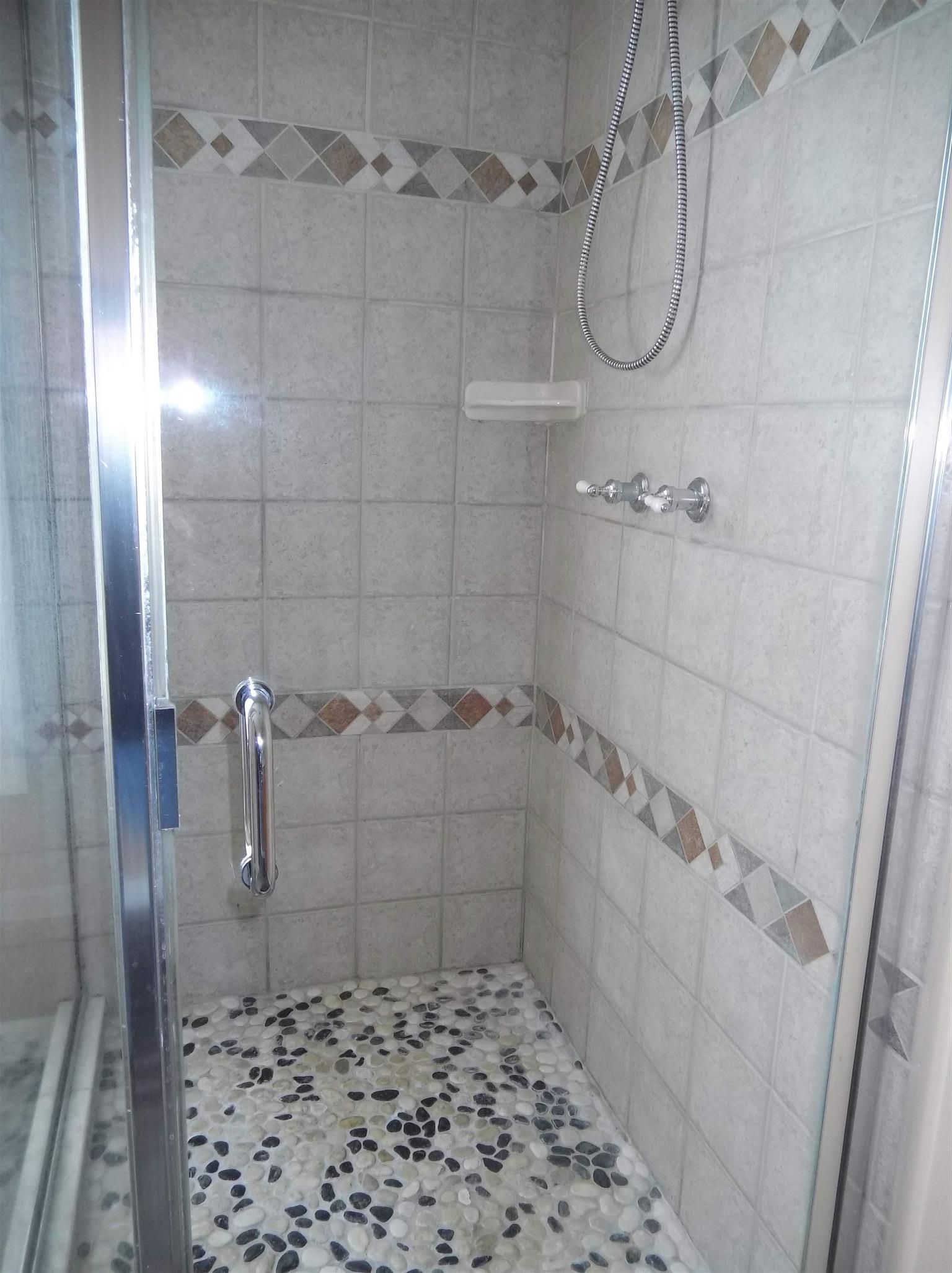 2590 Holloway Road Lebanon, TN 37090 - Photo 17 of 19 a bathroom with a shower