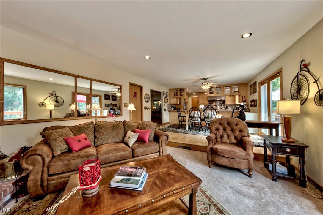 969 Cinnabar Court Incline Village, NV 89451 - Photo 11 of 28 a living room with furniture and a flat screen tv