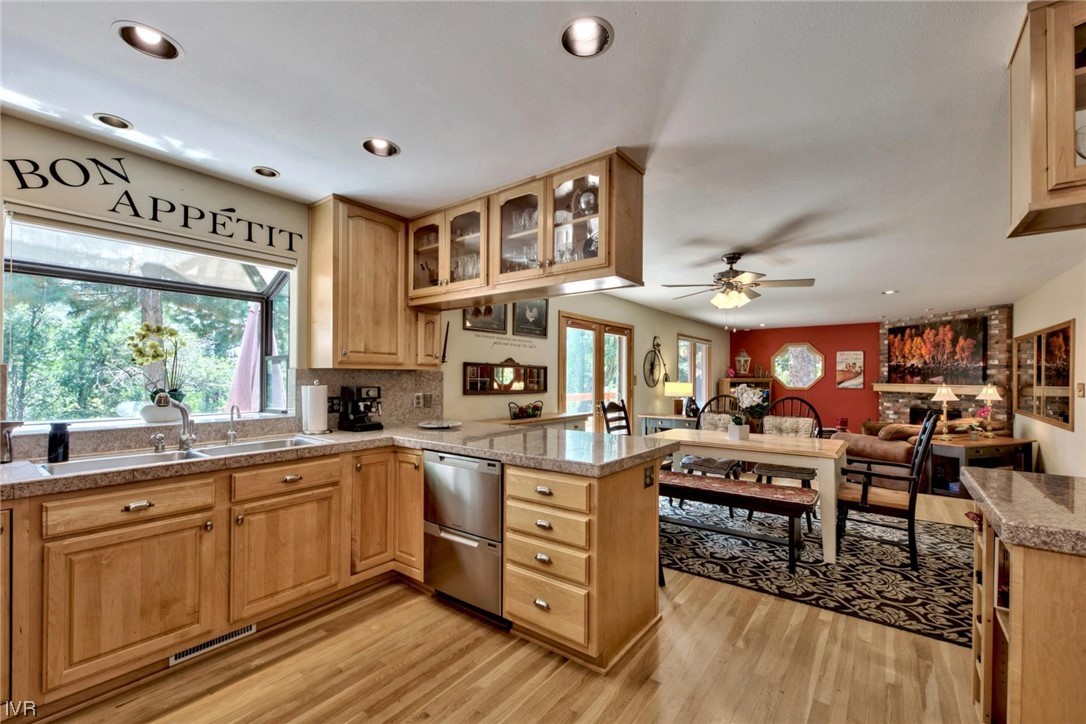969 Cinnabar Court Incline Village, NV 89451 - Photo 14 of 28 a open kitchen with stainless steel appliances granite countertop a stove and cabinets