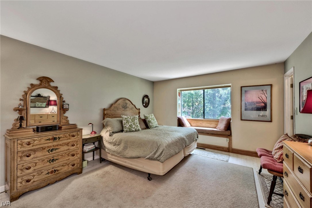 969 Cinnabar Court Incline Village, NV 89451 - Photo 16 of 28 a bedroom with a bed and a window