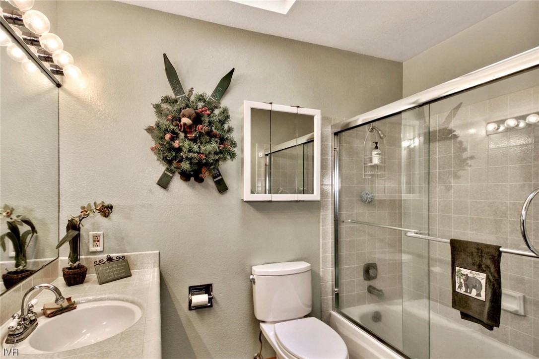 969 Cinnabar Court Incline Village, NV 89451 - Photo 19 of 28 a bathroom with a toilet sink and shower