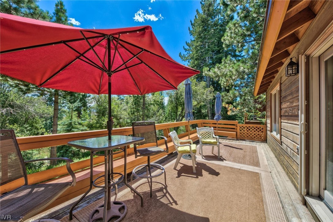 969 Cinnabar Court Incline Village, NV 89451 - Photo 4 of 28 a view of patio with chairs and umbrella