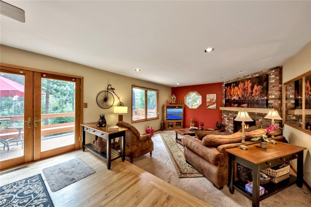 969 Cinnabar Court Incline Village, NV 89451 - Photo 5 of 28 a living room with furniture a rug and a window