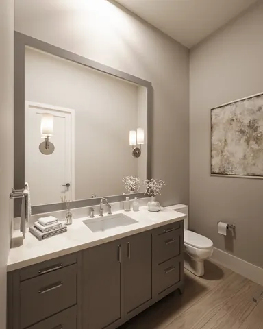 a bathroom with a double vanity sink mirror and toilet
