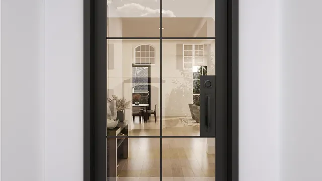 a bathroom with a glass shower door