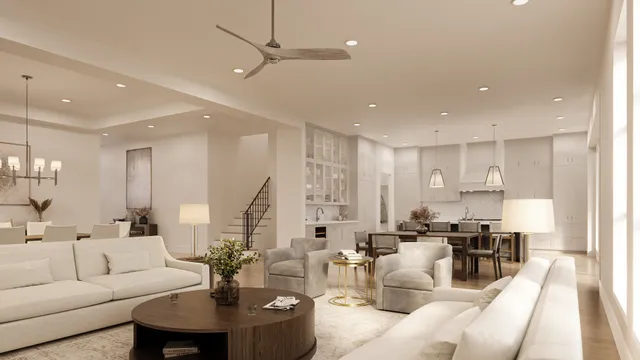 a living room with furniture kitchen view and a large window