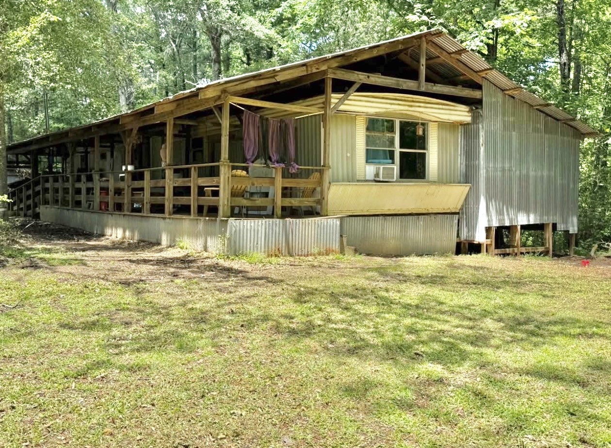 a view of a house with a swimming pool