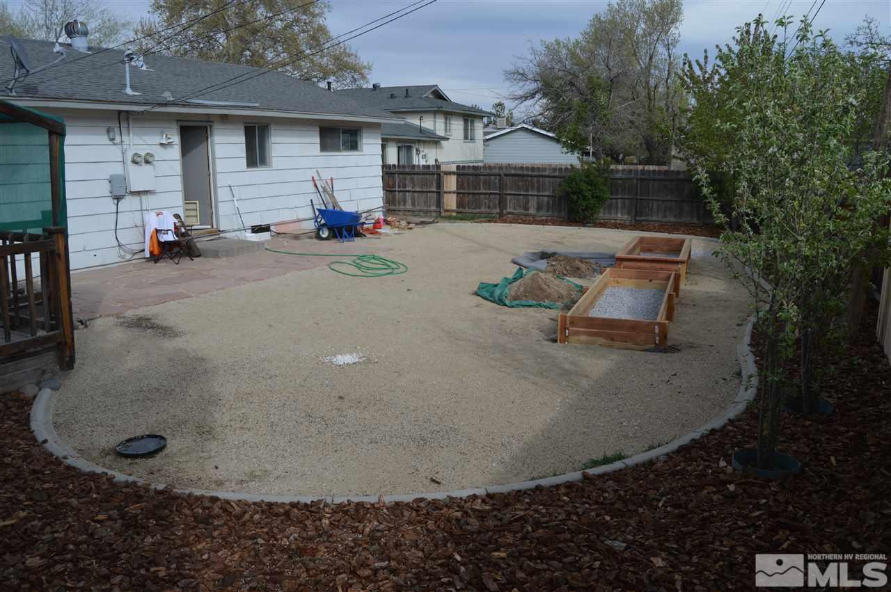 3245 Everett Drive Reno, NV 89503 - Photo 5 of 19 a view of a house with a yard