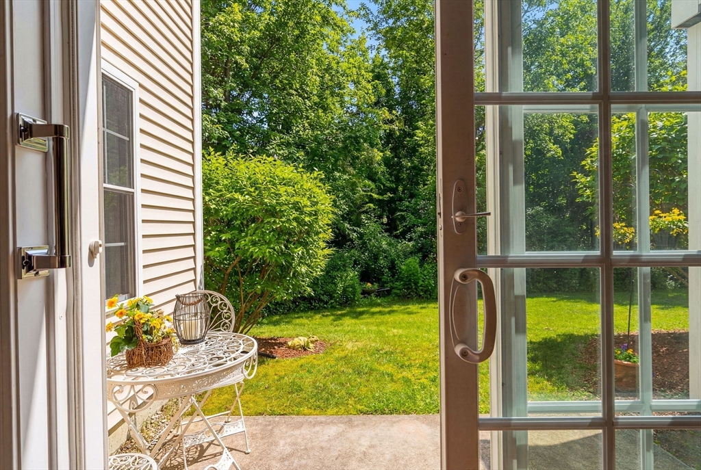 237 Salem Street, Unit 2 Reading, MA 01867 - Photo 1 of 34 a view of swimming pool from a yard