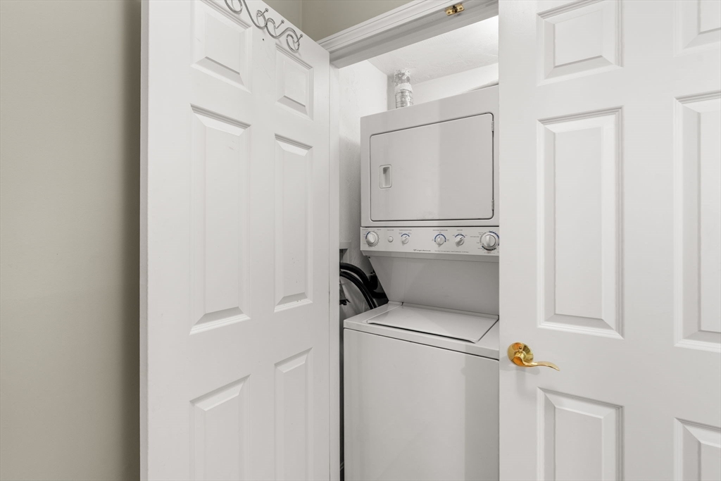 237 Salem Street, Unit 2 Reading, MA 01867 - Photo 23 of 34 a utility room with dryer and washer