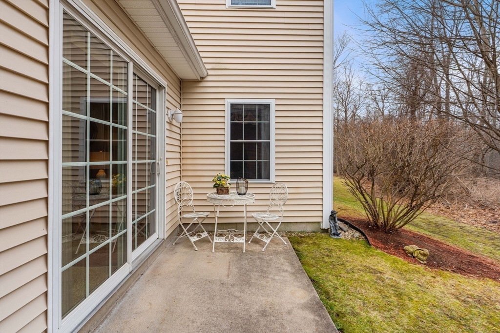 237 Salem Street, Unit 2 Reading, MA 01867 - Photo 28 of 34 a view of the house with a yard