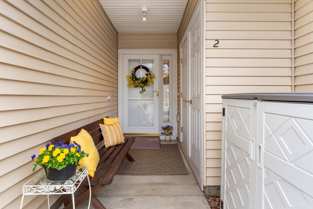 237 Salem Street, Unit 2 Reading, MA 01867 - Photo 3 of 34 a view of a entryway door of the house
