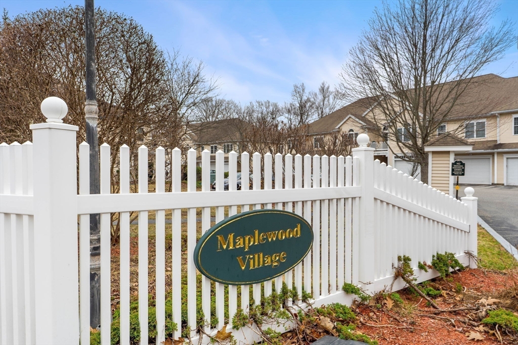 237 Salem Street, Unit 2 Reading, MA 01867 - Photo 31 of 34 a sign on the side of a building