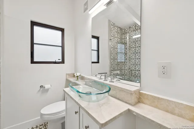 a bathroom with a shower curtain