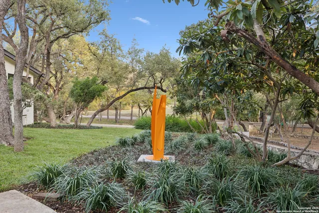a view of a patio with table and chairs