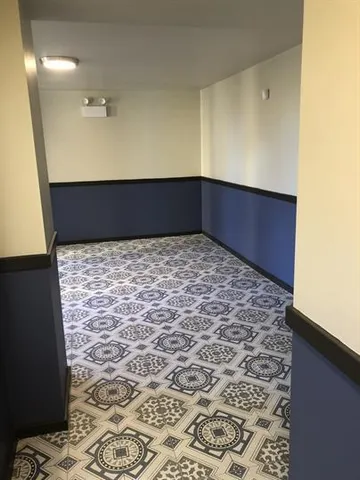 a bathroom with a sink and a shower