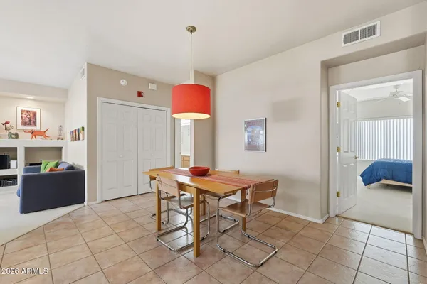 a view of a dining room with furniture
