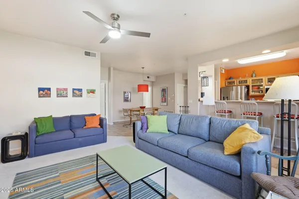 a living room with furniture and a couch