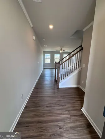 a view of entryway with wooden floor