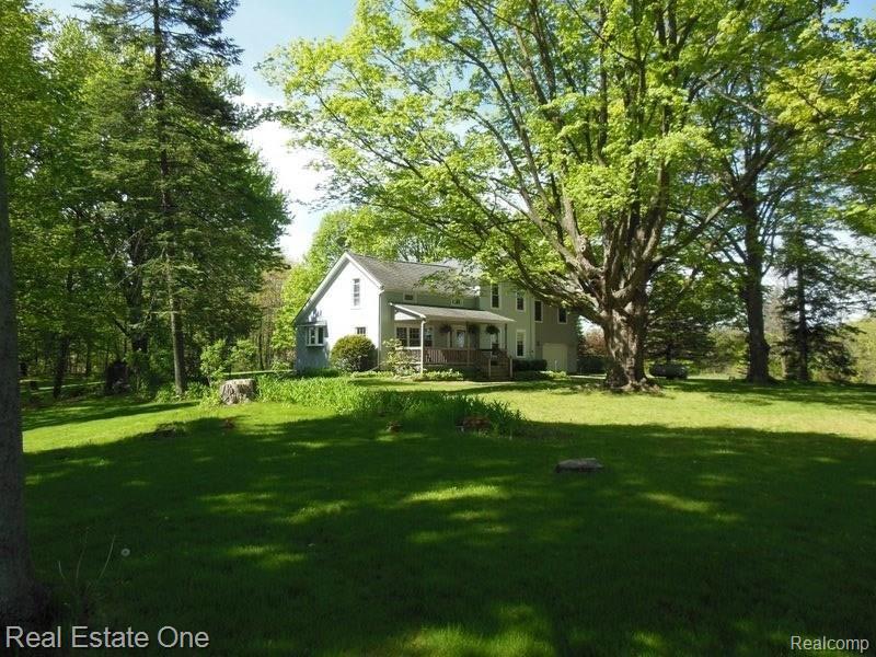 4747 Deal Road Fowlerville, MI 48836 - Photo 4 of 54 Large country porch